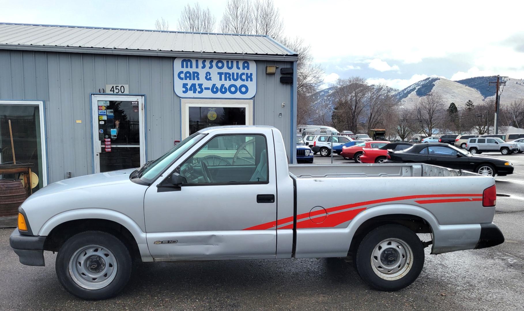 1994 Silver /Brown Chevrolet S10 Pickup (1GCCS144XR8) with an 2.2L I4 engine, 5 Speed Manual transmission, located at 450 N Russell, Missoula, MT, 59801, (406) 543-6600, 46.874496, -114.017433 - Good running little truck. 5 Speed Manual Transmission. AM FM Cassette. Financing NOT Available. - Photo#0